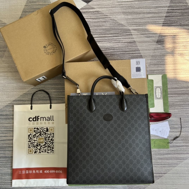 G*u*i shopping bags